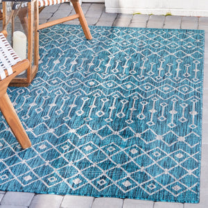 Outdoor Tribal Trellis Rug in Teal